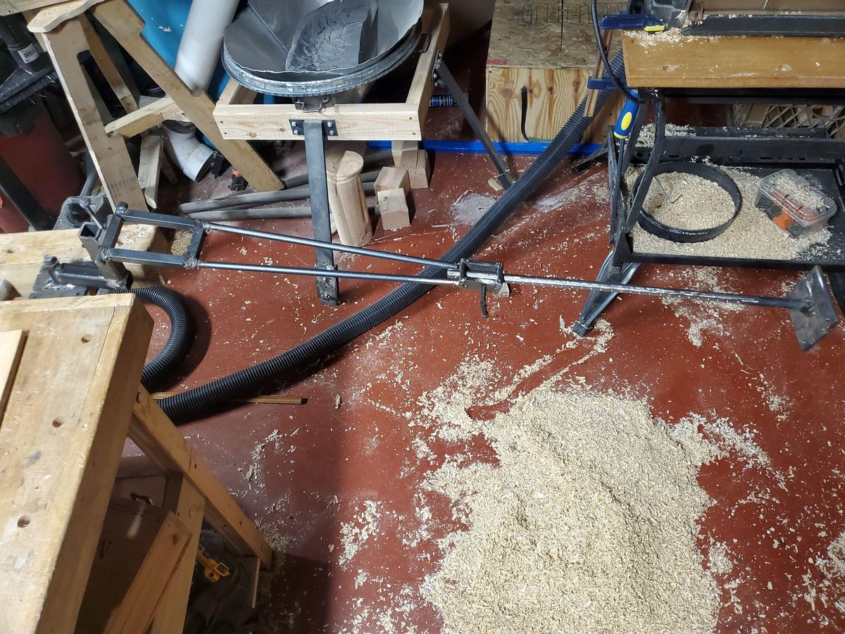 Articulating arm fully extended in shop